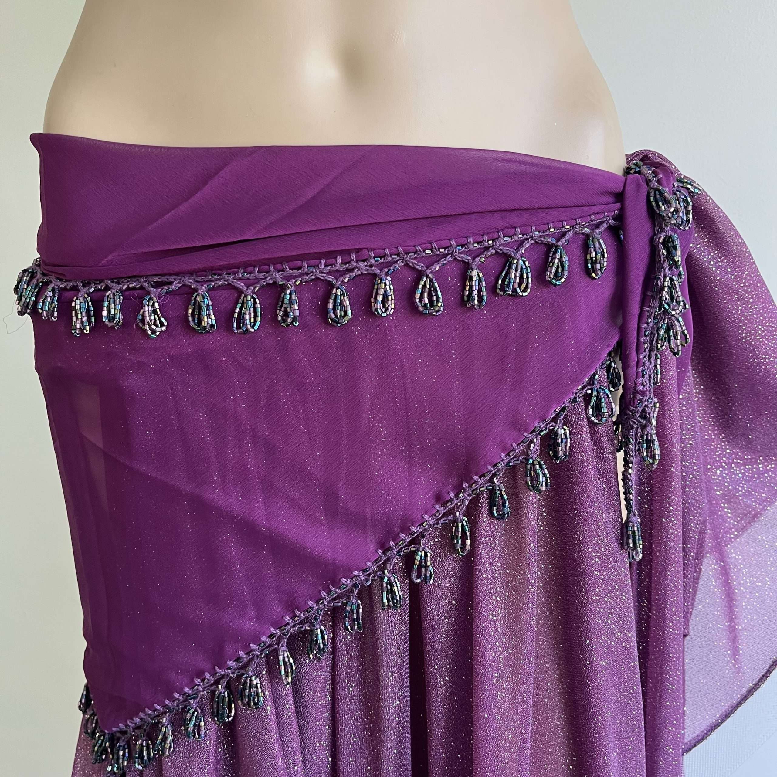 Triangular con borde de mostacilla