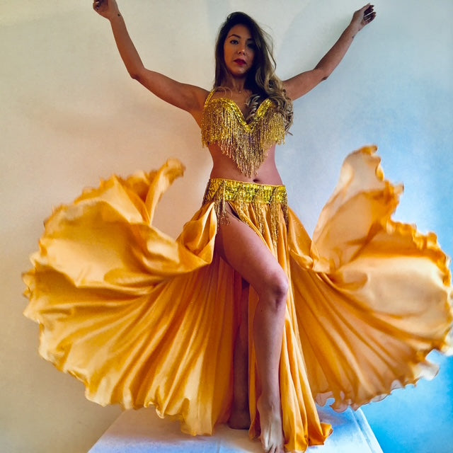 Conjunto dorado con flecos